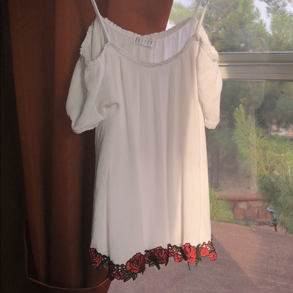 A nice shirt that shows shoulders